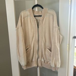 FREE PEOPLE Robby Bomber in Shell Pink.